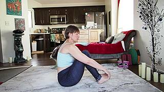 the mature wife participates in yoga lesson 356 focusing on poses and relaxation