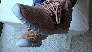 kristy shows off her new sneakers close up 👟