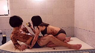 Emotional chocolate slick sex in bathroom