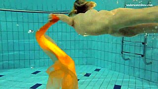 Nastya strips and shows her naked body in the pool