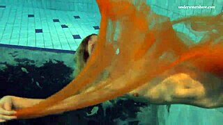 Nastya strips and shows her naked body in the pool