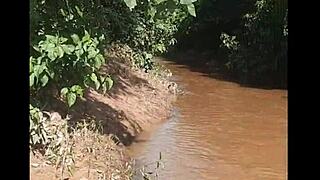 a teen gets double penetrated in the river outdoors