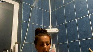 Lesbian shower turns into big tits bathing tease!