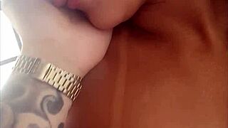 brunette gives blowjob backstage