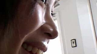 Asian teen gives blowjob