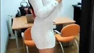 Zamira and Aleja in costumes watching the Ecuador game