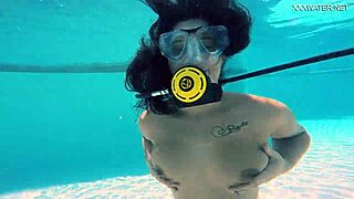 brita piskova dives underwater in the swimming pool. the teen 18+ masturbates solo.