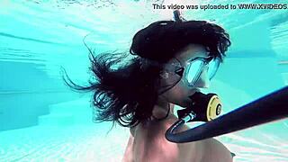 brita piskova dives underwater in the swimming pool. the teen 18+ masturbates solo.
